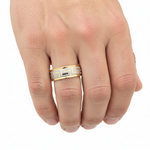 Gold Two Tone Meander Band Ring on man's finger